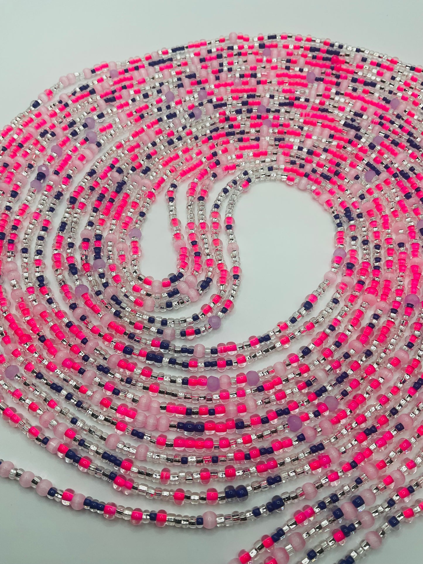 Pink royalty tie on Waistbeads