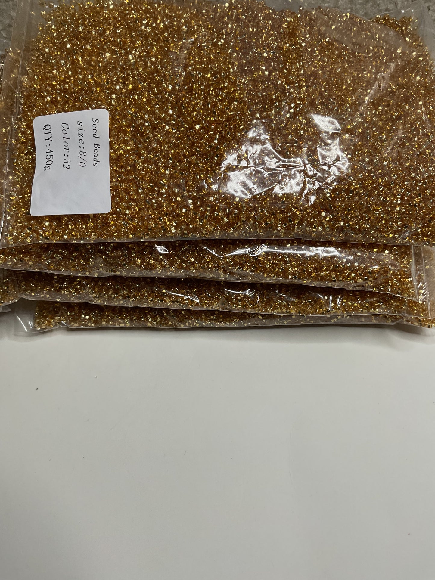 8/0 Gold and silver glass beads