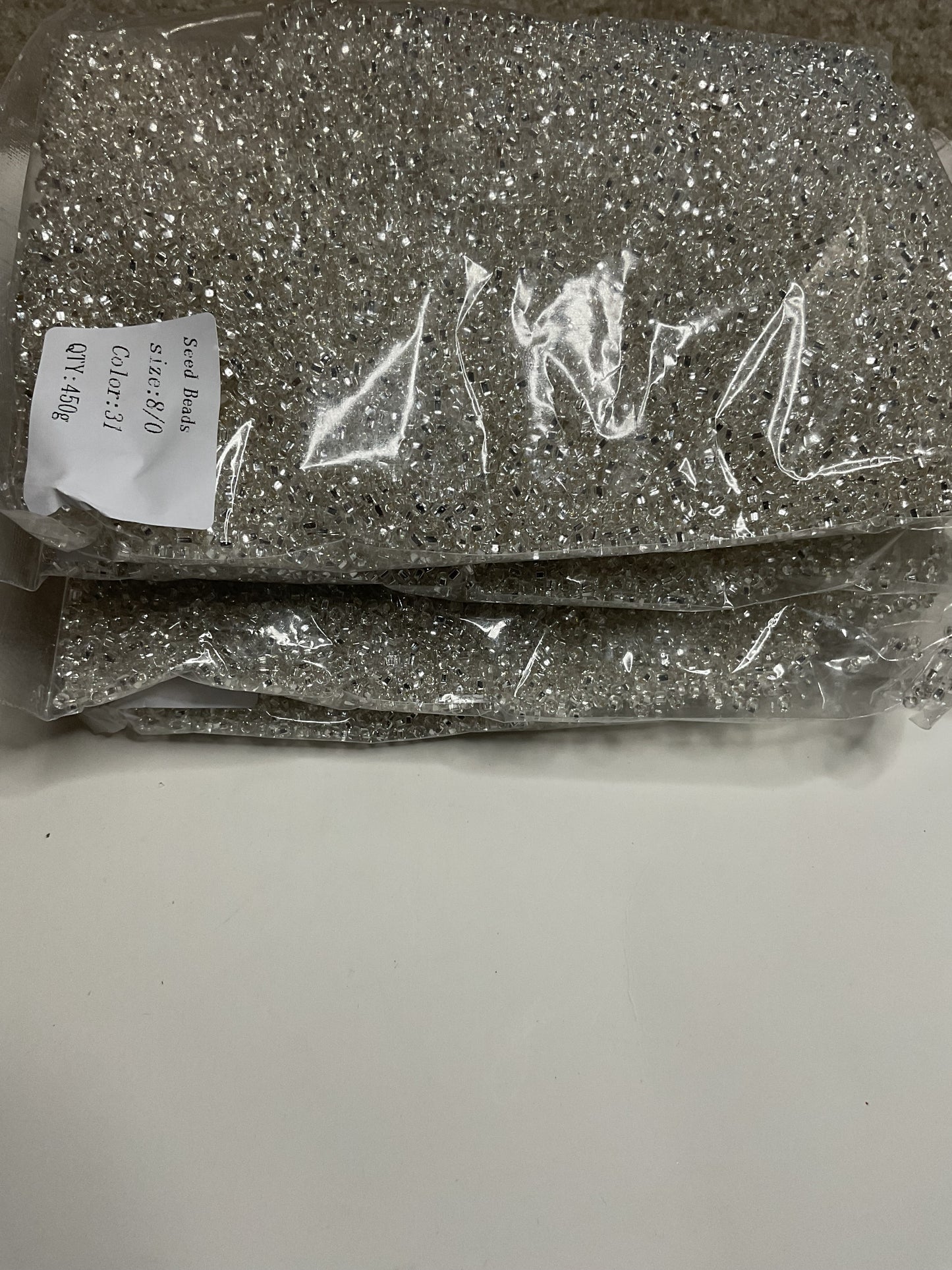 8/0 Gold and silver glass beads