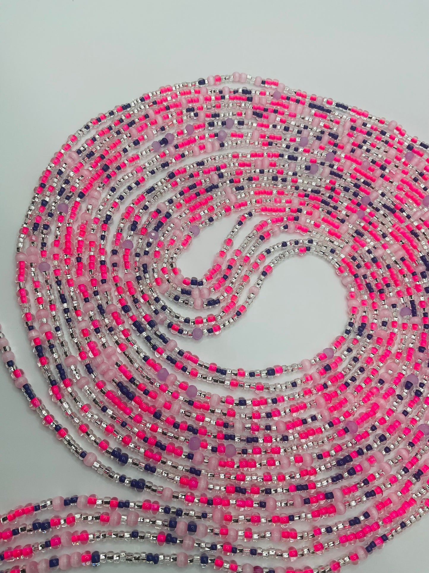 Pink royalty tie on Waistbeads