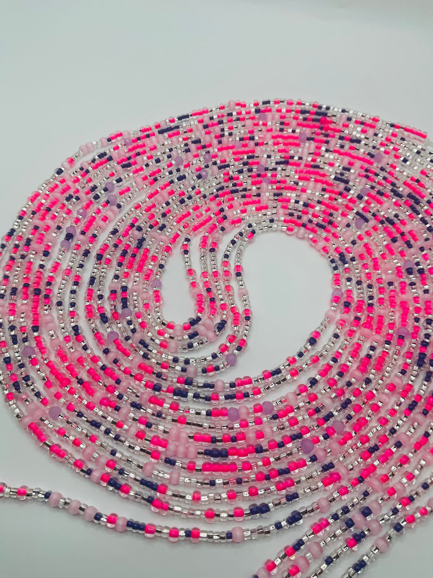 Pink royalty tie on Waistbeads