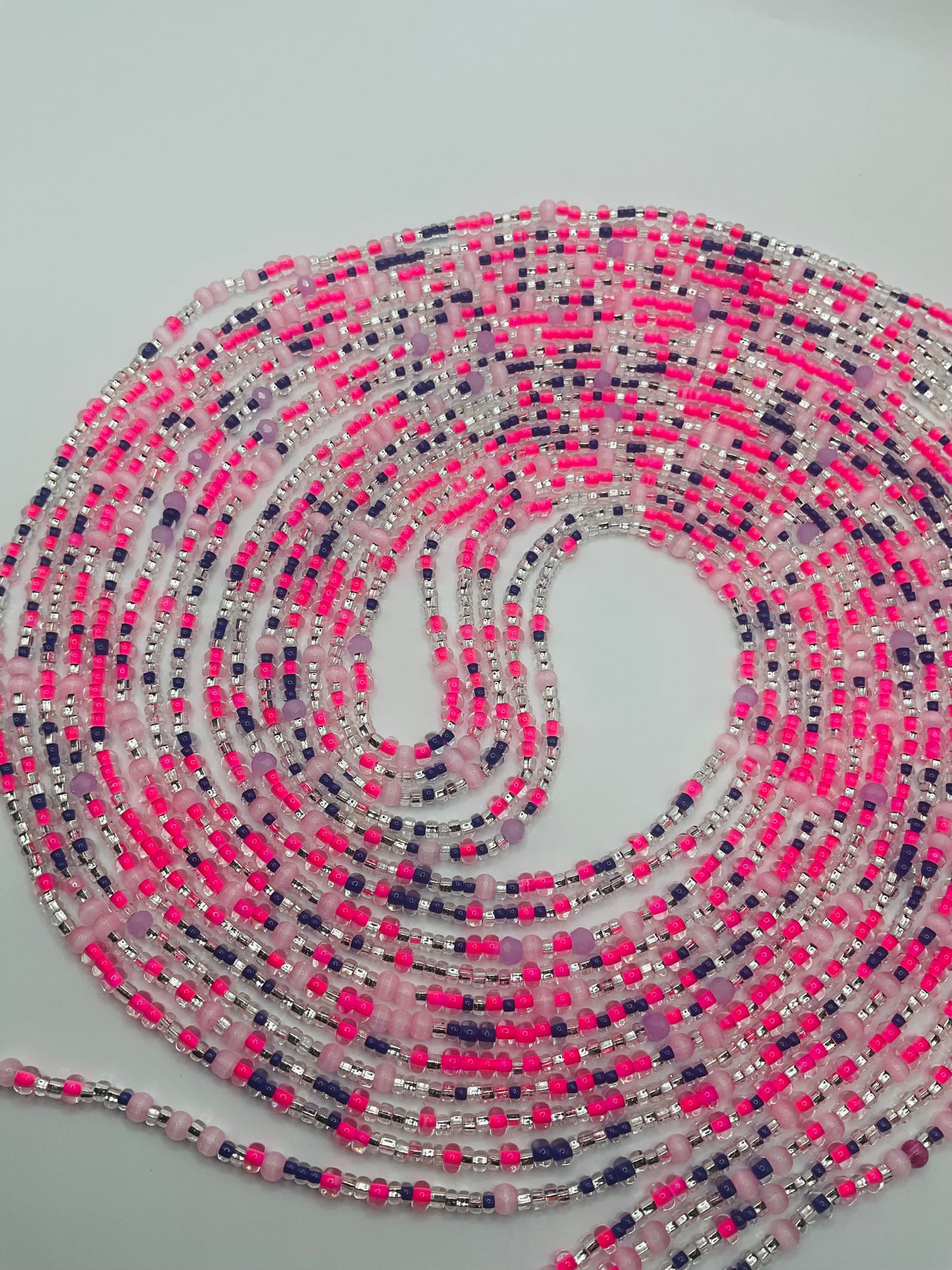 Pink royalty tie on Waistbeads