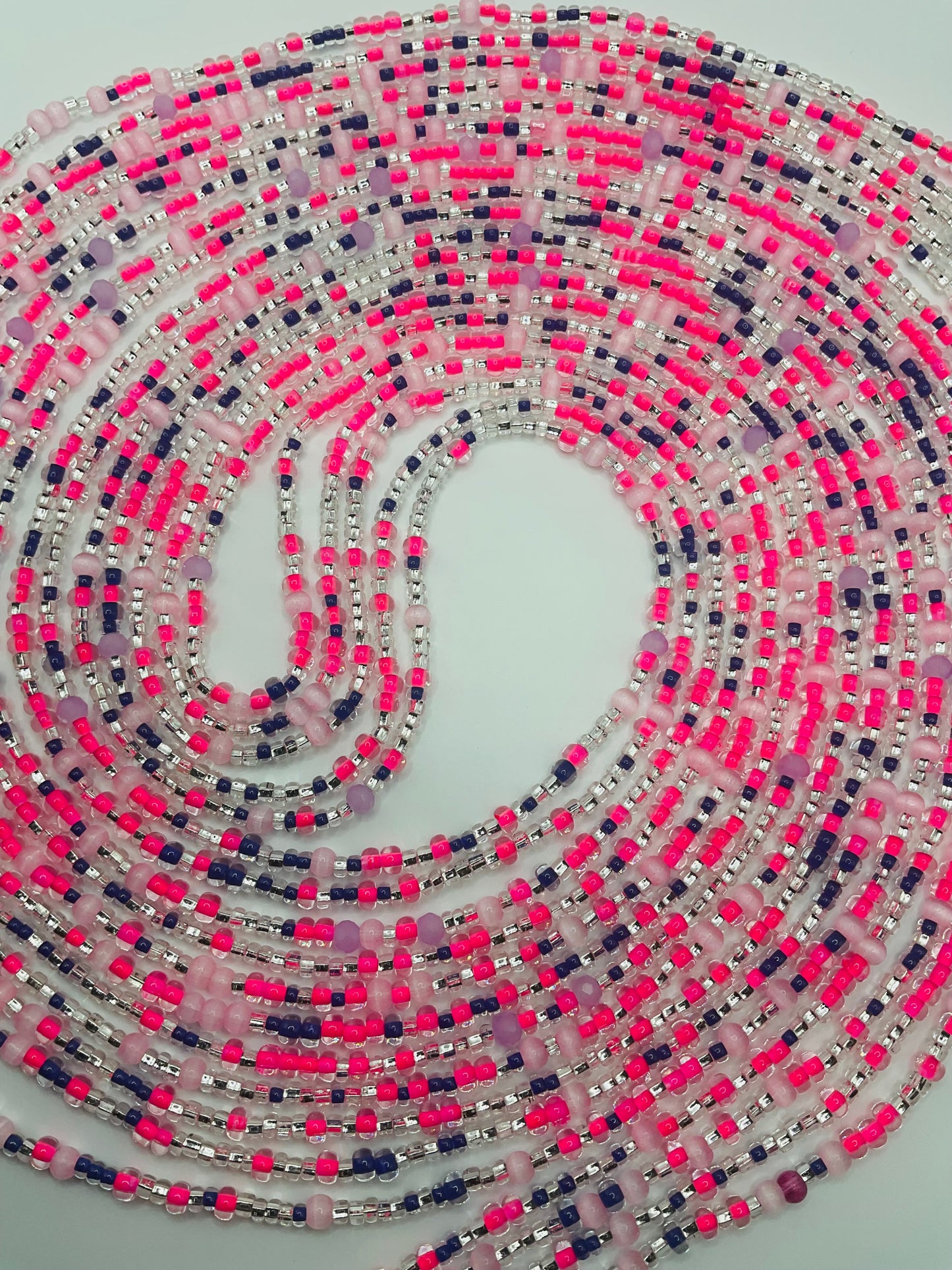 Pink royalty tie on Waistbeads