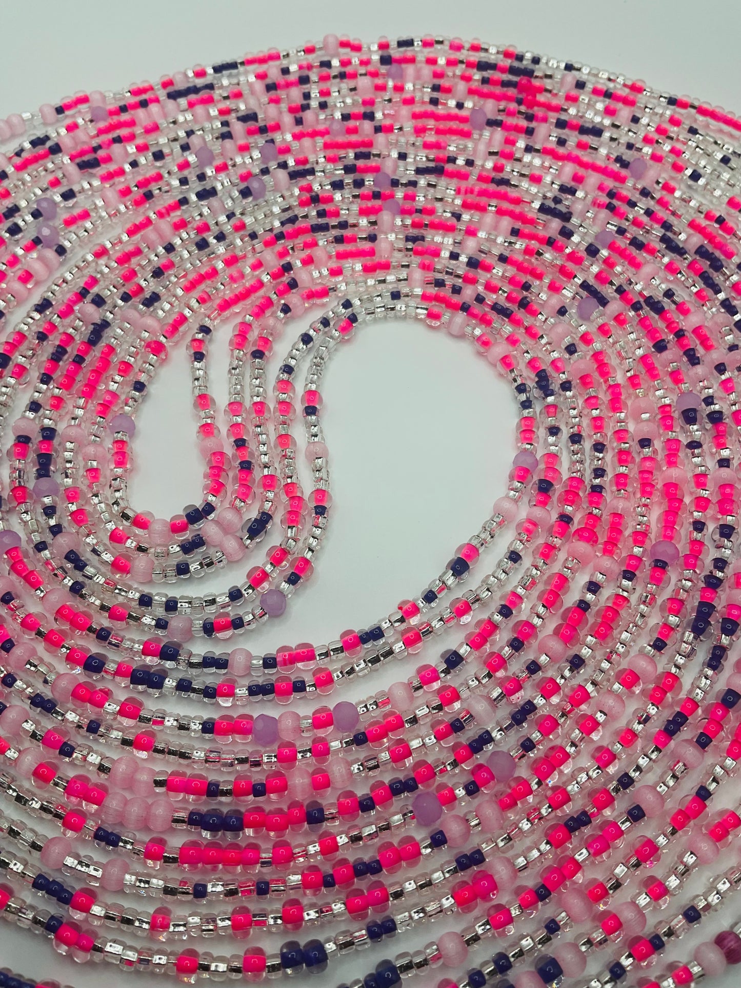 Pink royalty tie on Waistbeads
